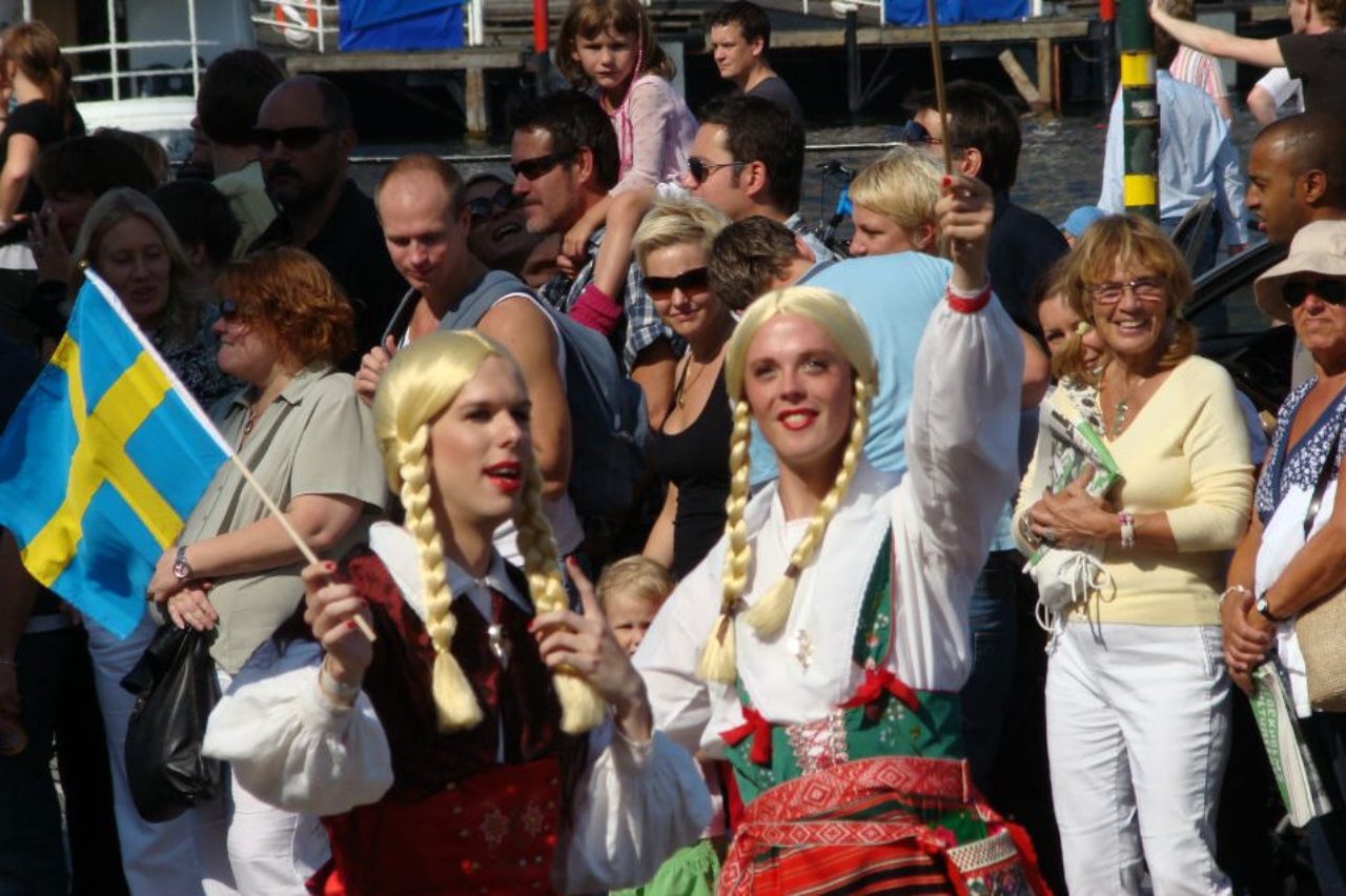 sweden-festival-holding-flag