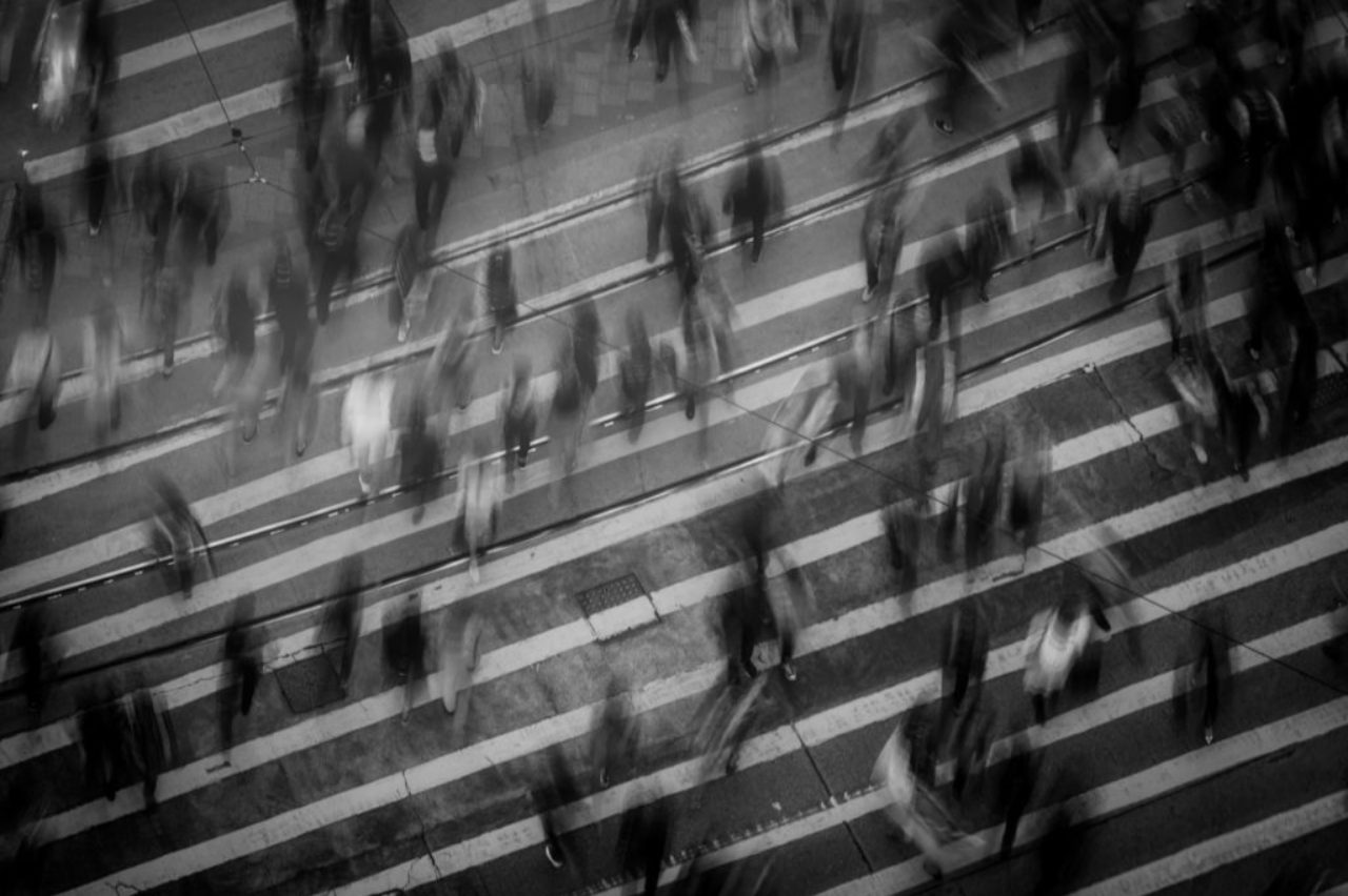 time-lapse-photography-of-people-walking-on-pedestrian-lane-8423391